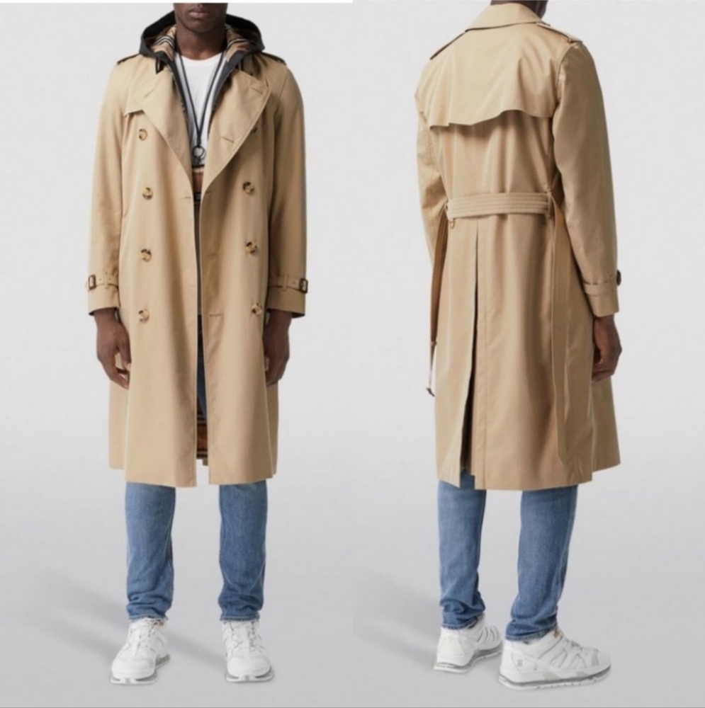 Size: 42R Burberry  trench coat with wool insert.